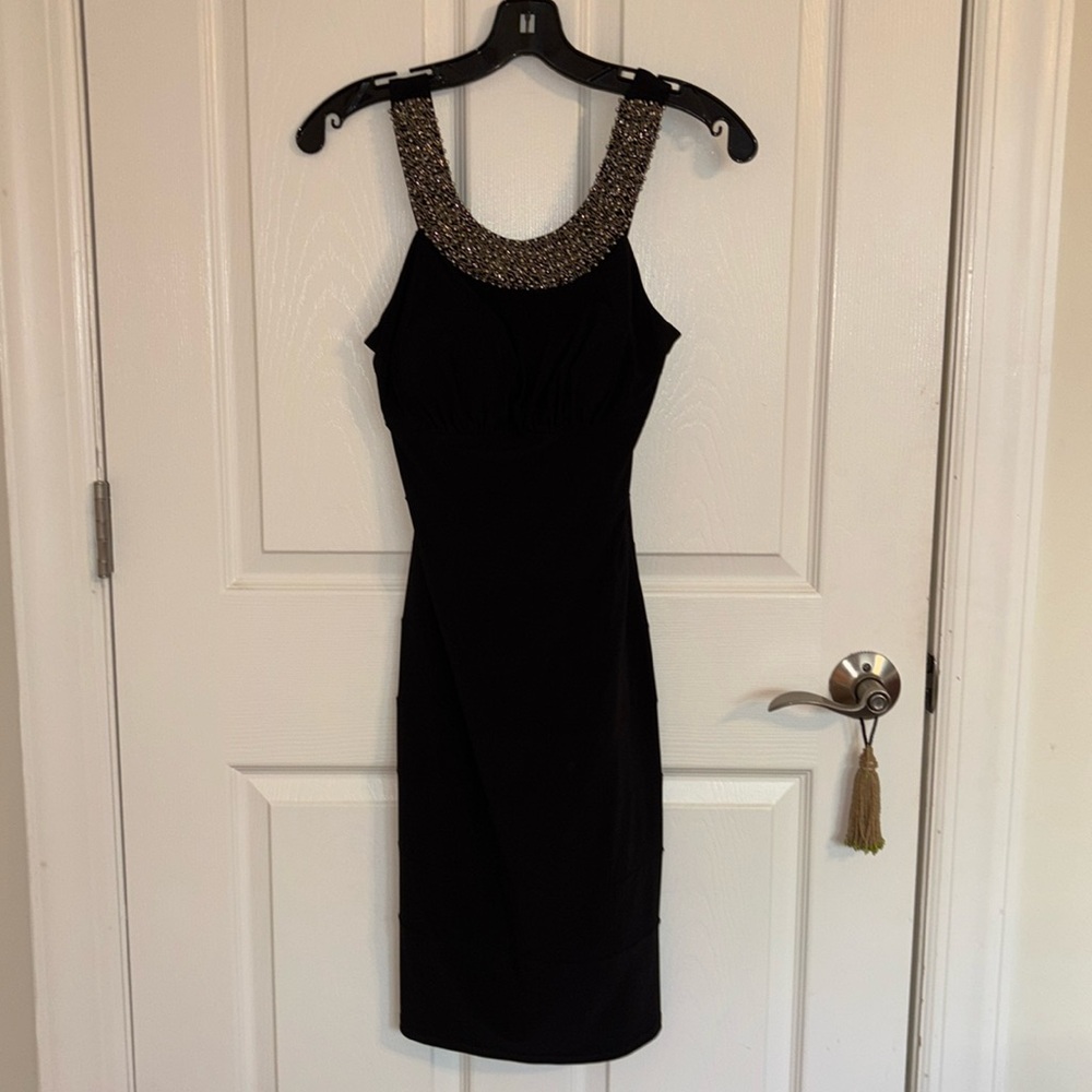 Bejewel neckline party dress. Size 6